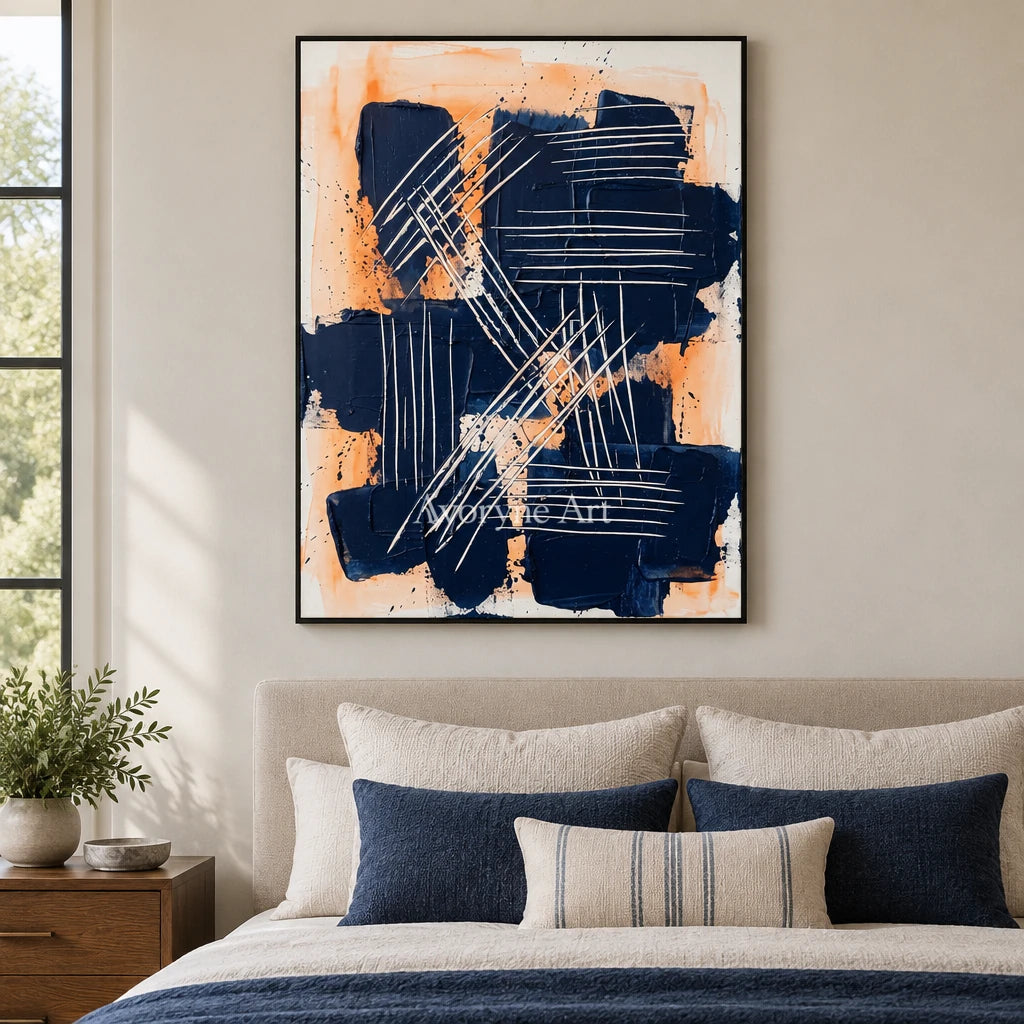 Silver Current abstract brushwork wall art with a black frame above a bed in a bedroom