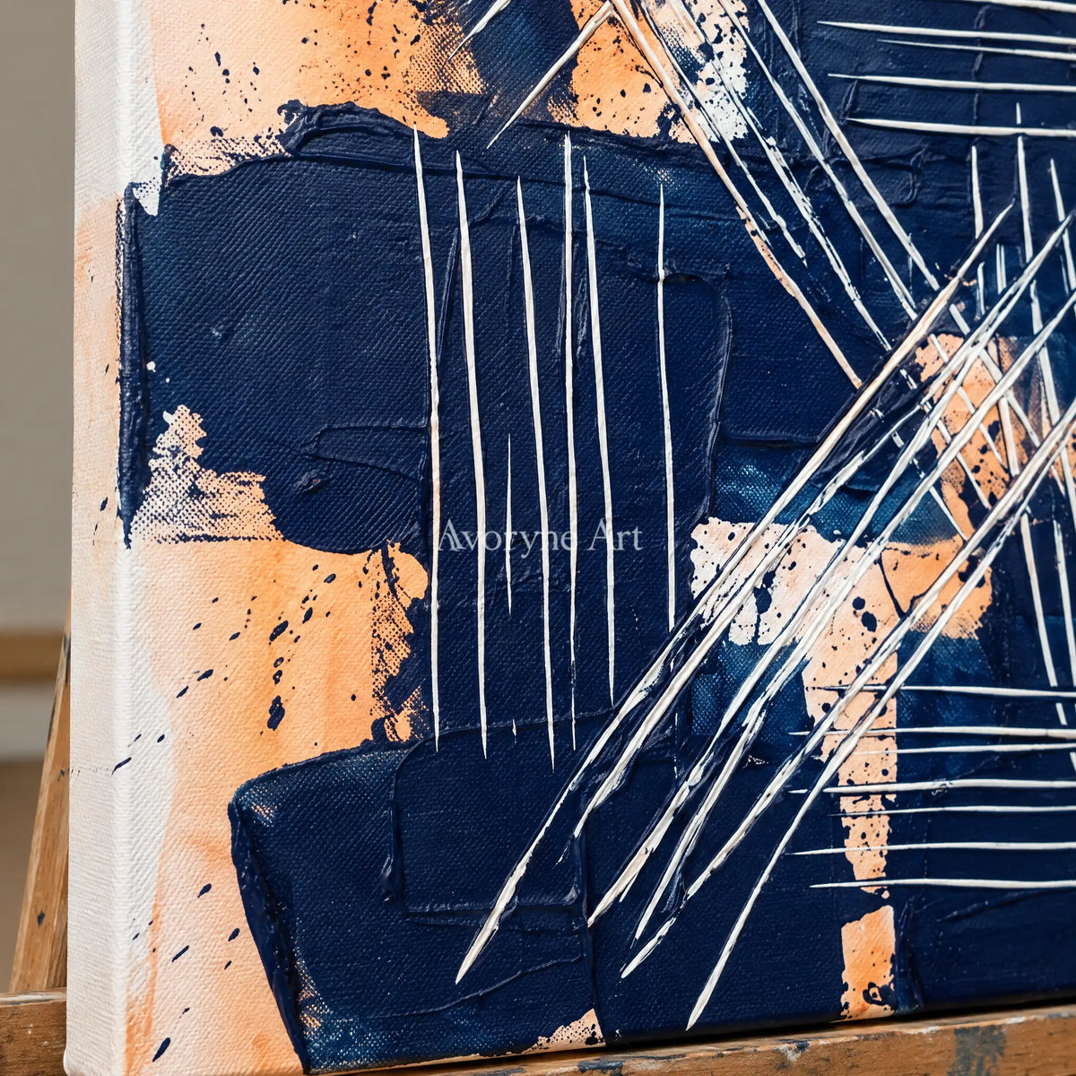 Close-up of the hand-painted texture of Silver Current abstract brushwork wall art on an easel