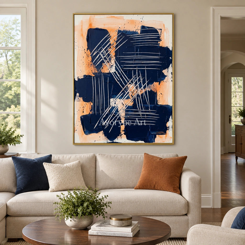 Silver Current abstract brushwork wall art with a gold frame hanging in a living room