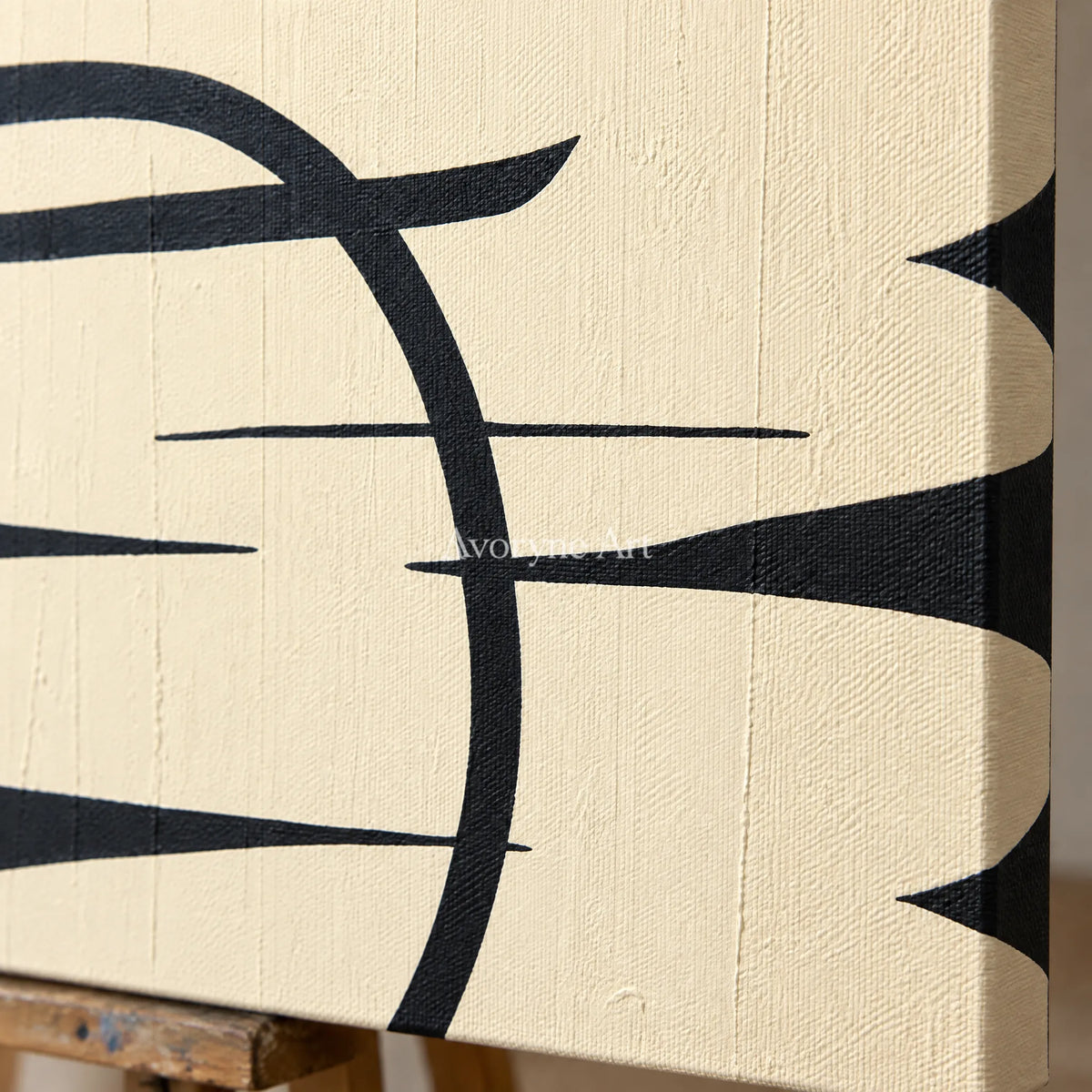 Close-up of the hand-painted texture of Muted Trace black ivory line art diptych on an easel