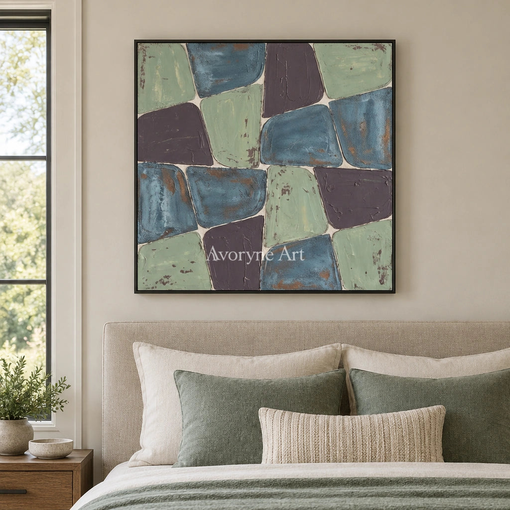 Soft Interval block relief wall art with a black frame above a bed in a bedroom