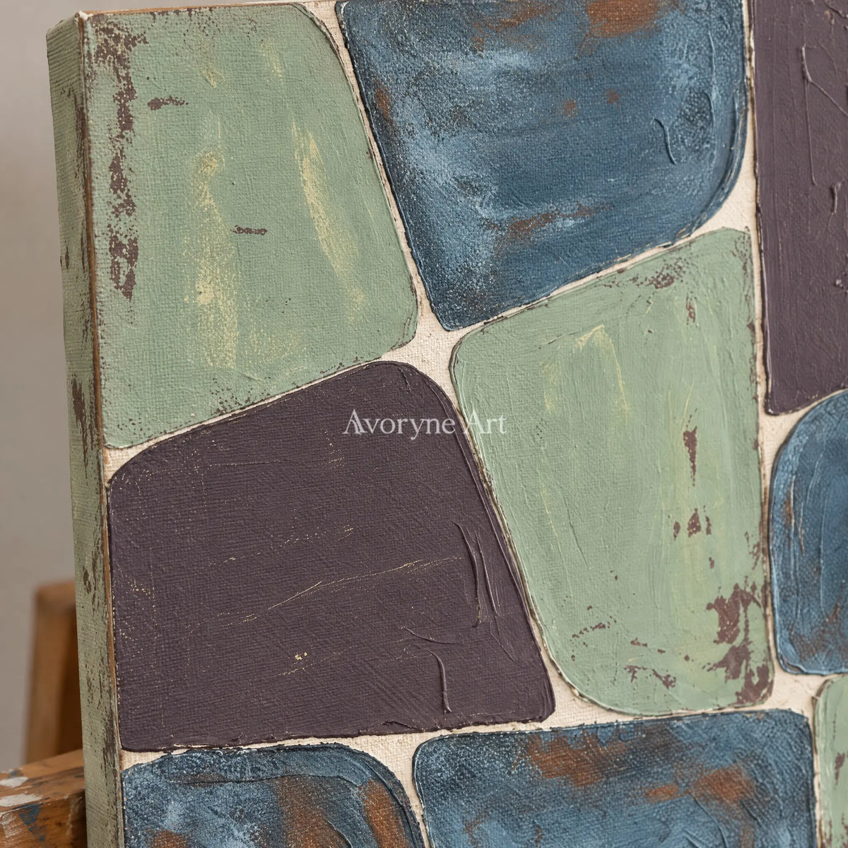 Close-up of the hand-painted texture of Soft Interval block relief wall art on an easel