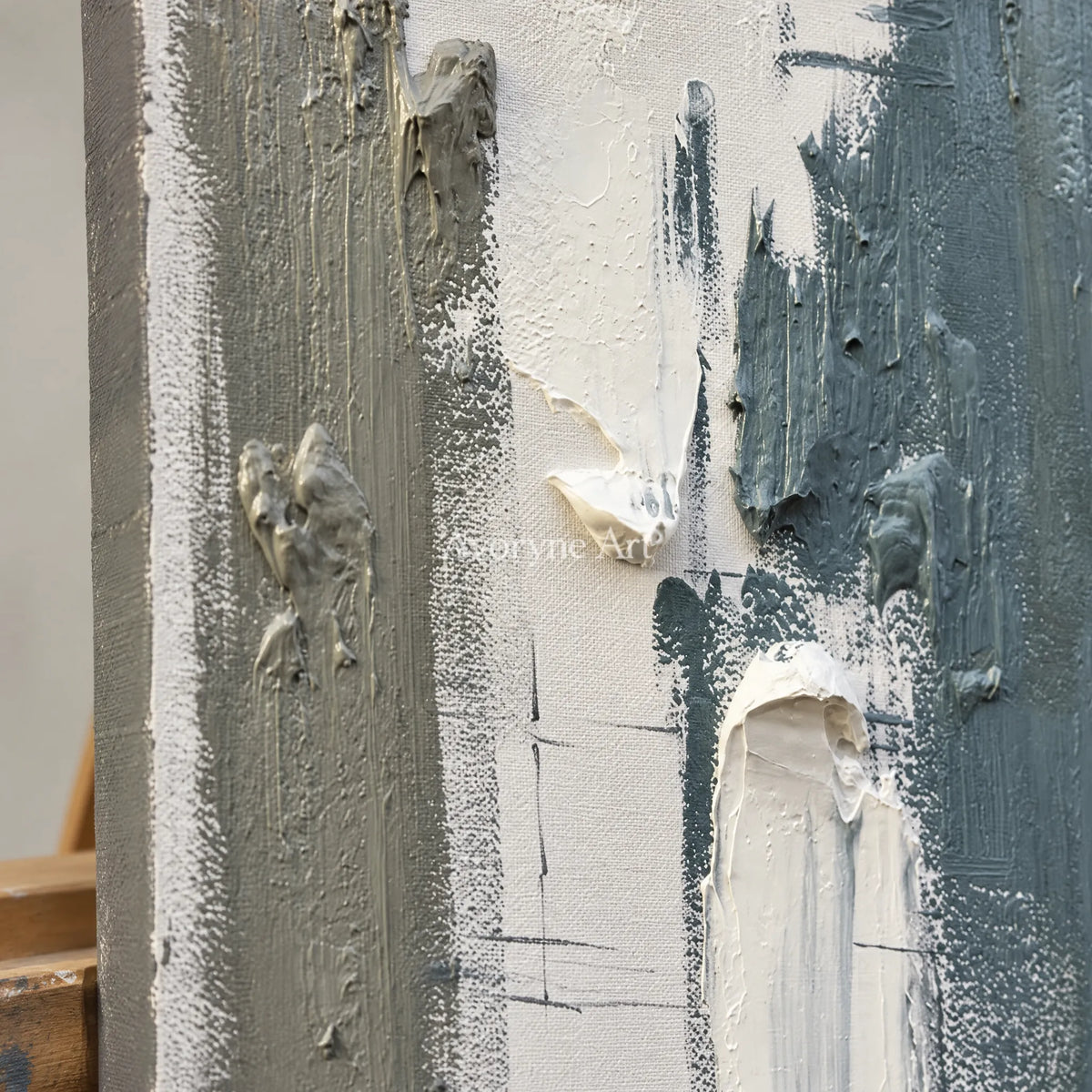 Close-up of the hand-painted texture of Muted Mosaic blue flow texture diptych on an easel