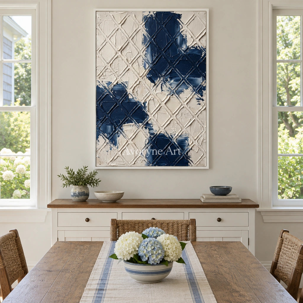 Weathered Current blue ivory grid wall art with a white frame in a dining room