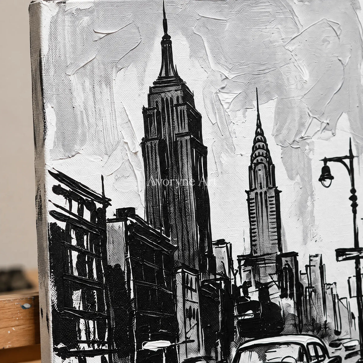 Close-up of the hand-painted texture of Silver Echo cityscape wall art on an easel