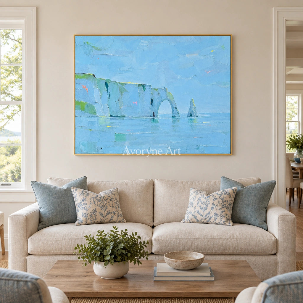 Tender Drift coastal landscape wall art with a gold frame hanging in a living room