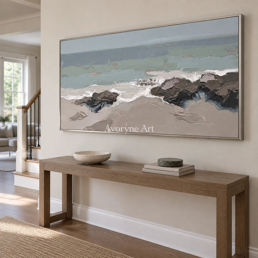 Restful Echo coastal landscape wall art with a silver frame in an entryway