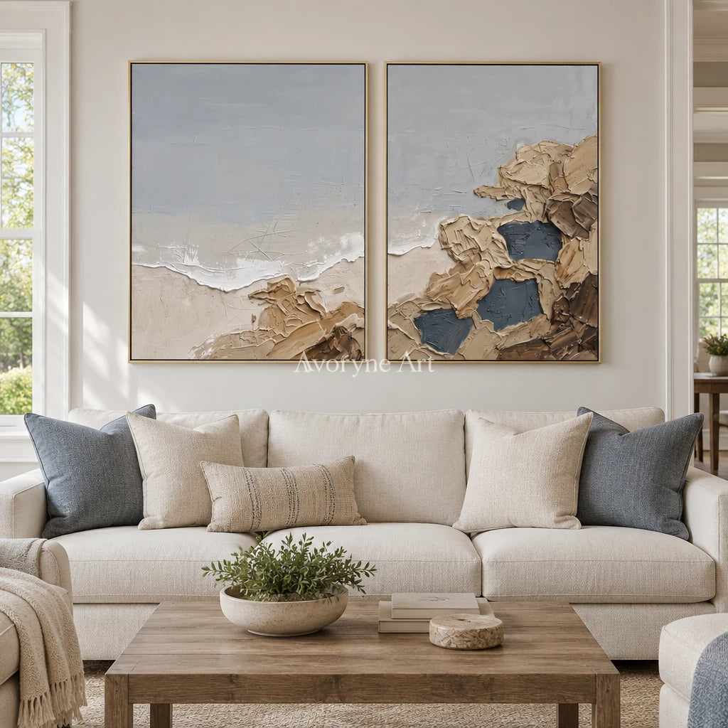 Restful Drift coastal landscape diptych with a gold frame hanging in a living room