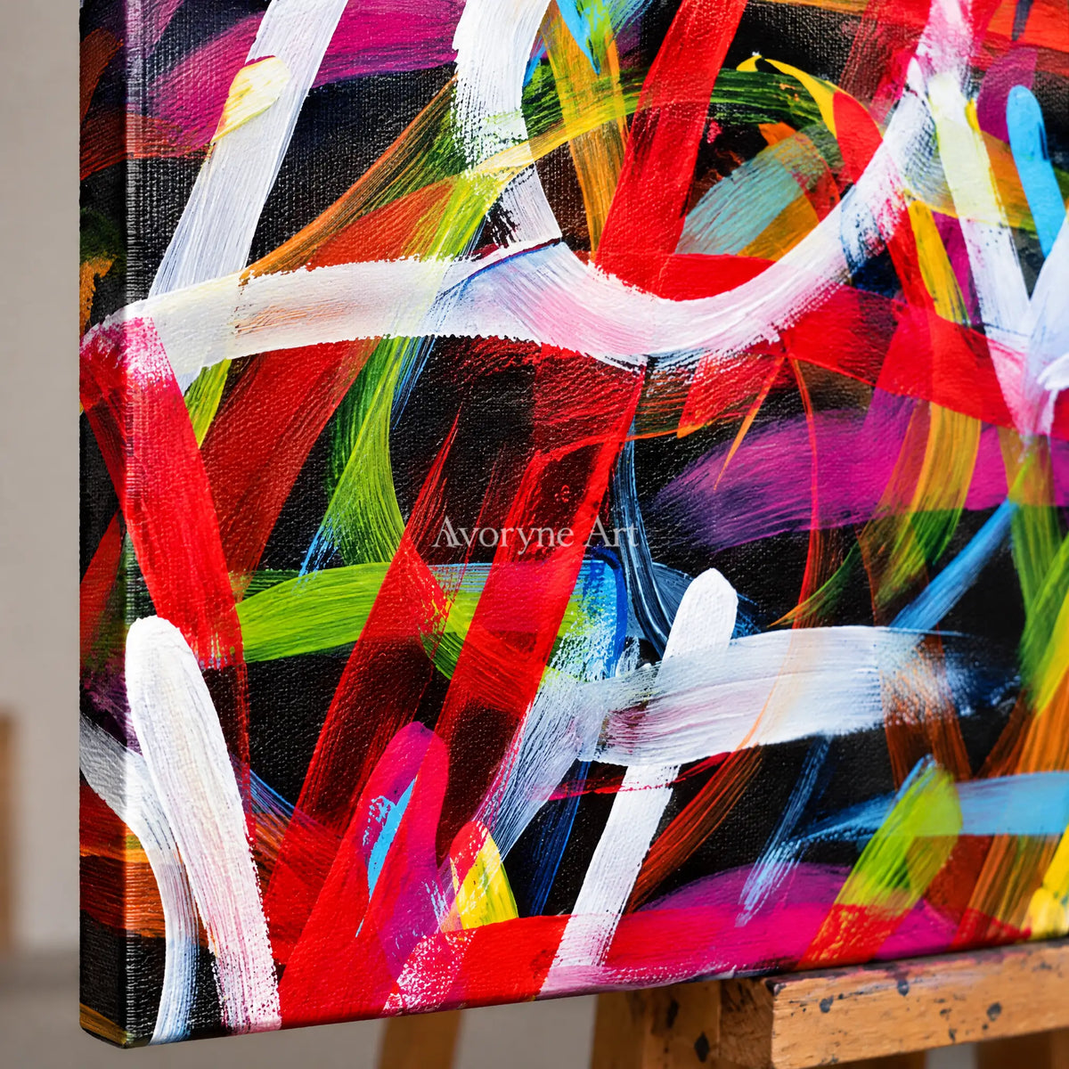 Close-up of the hand-painted texture of Hidden Story colorful love wall art on an easel