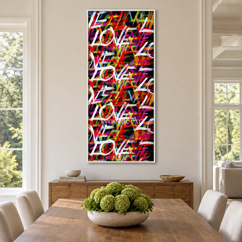 Hidden Story colorful love wall art with a white frame in a dining room