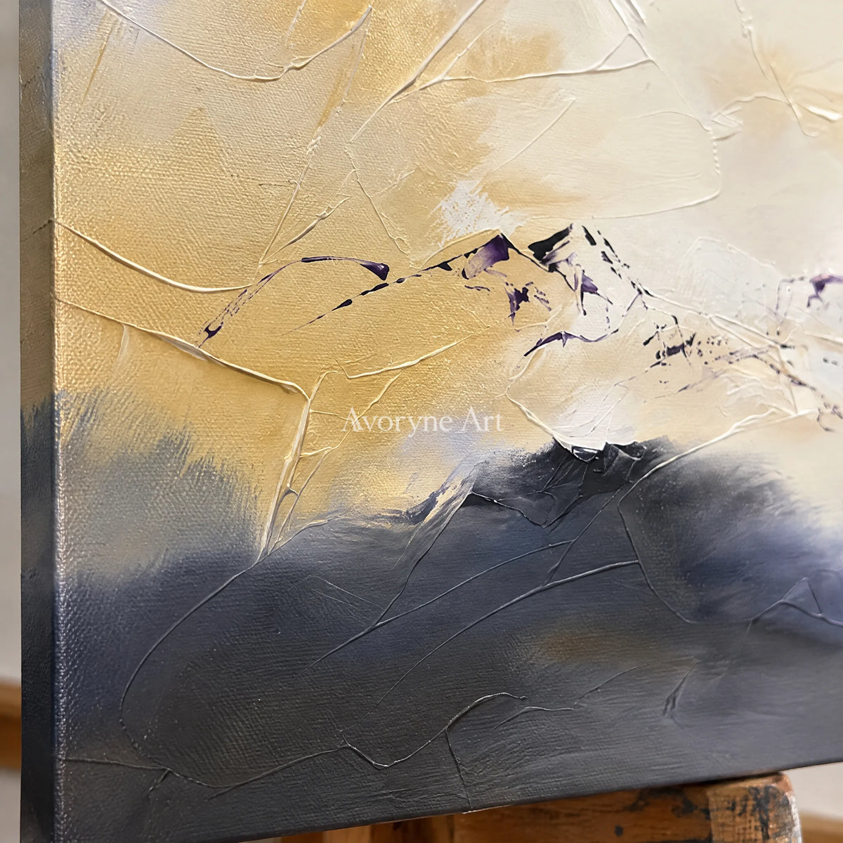 Close-up of the hand-painted texture of Pale Verse colorful mountain wall art on an easel