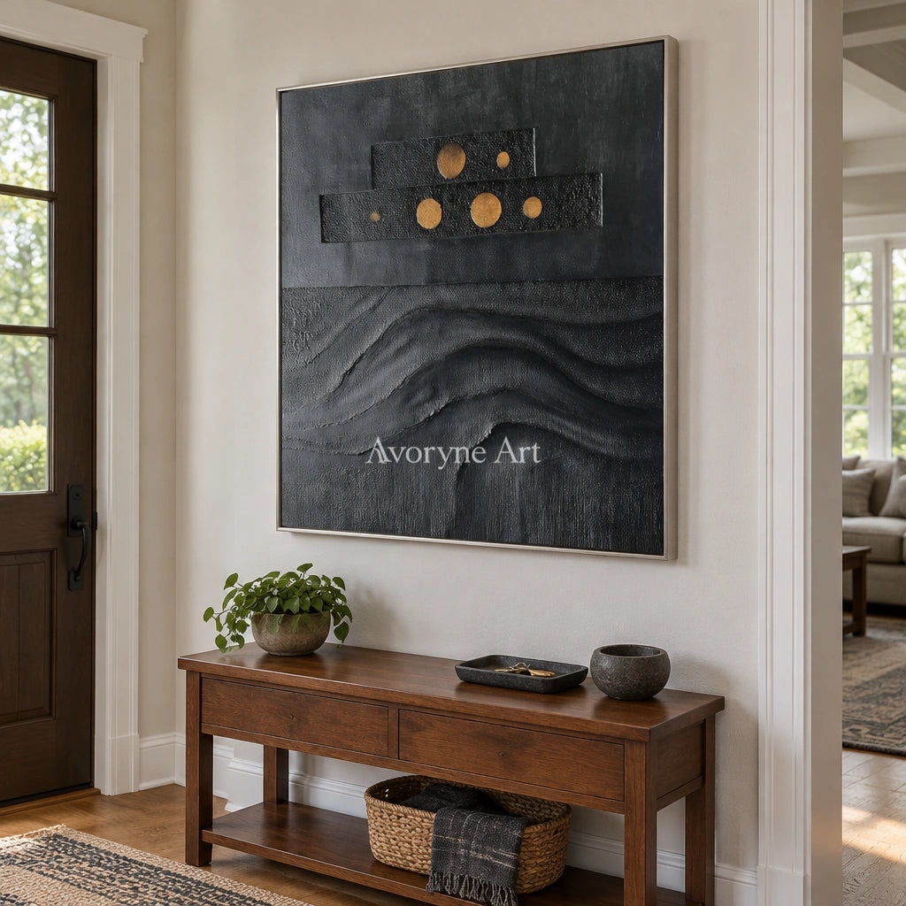 Woven Sonata dark mineral relief wall art with a silver frame in an entryway