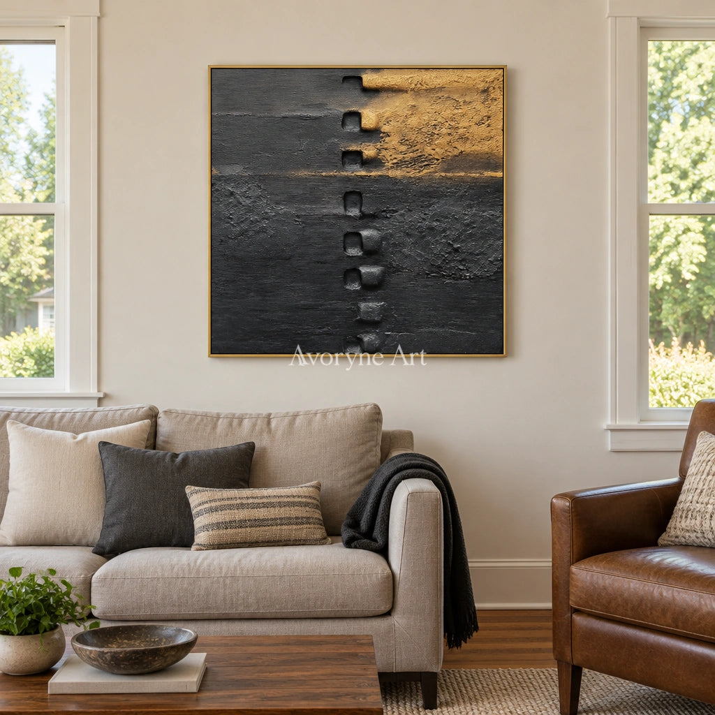 Quiet Refrain dark mineral relief wall art with a gold frame hanging in a living room