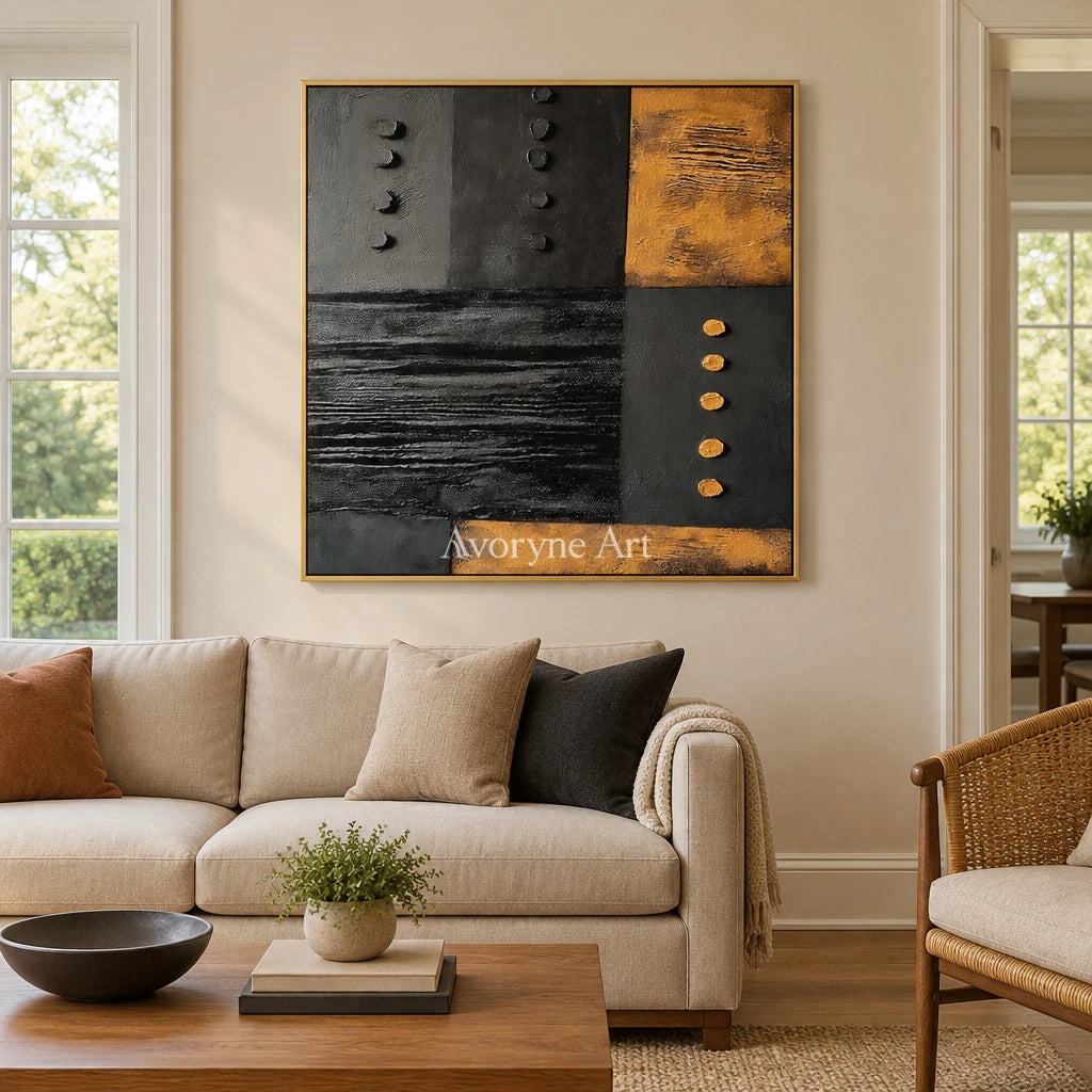 Quiet Haven dark mineral relief wall art with a gold frame hanging in a living room