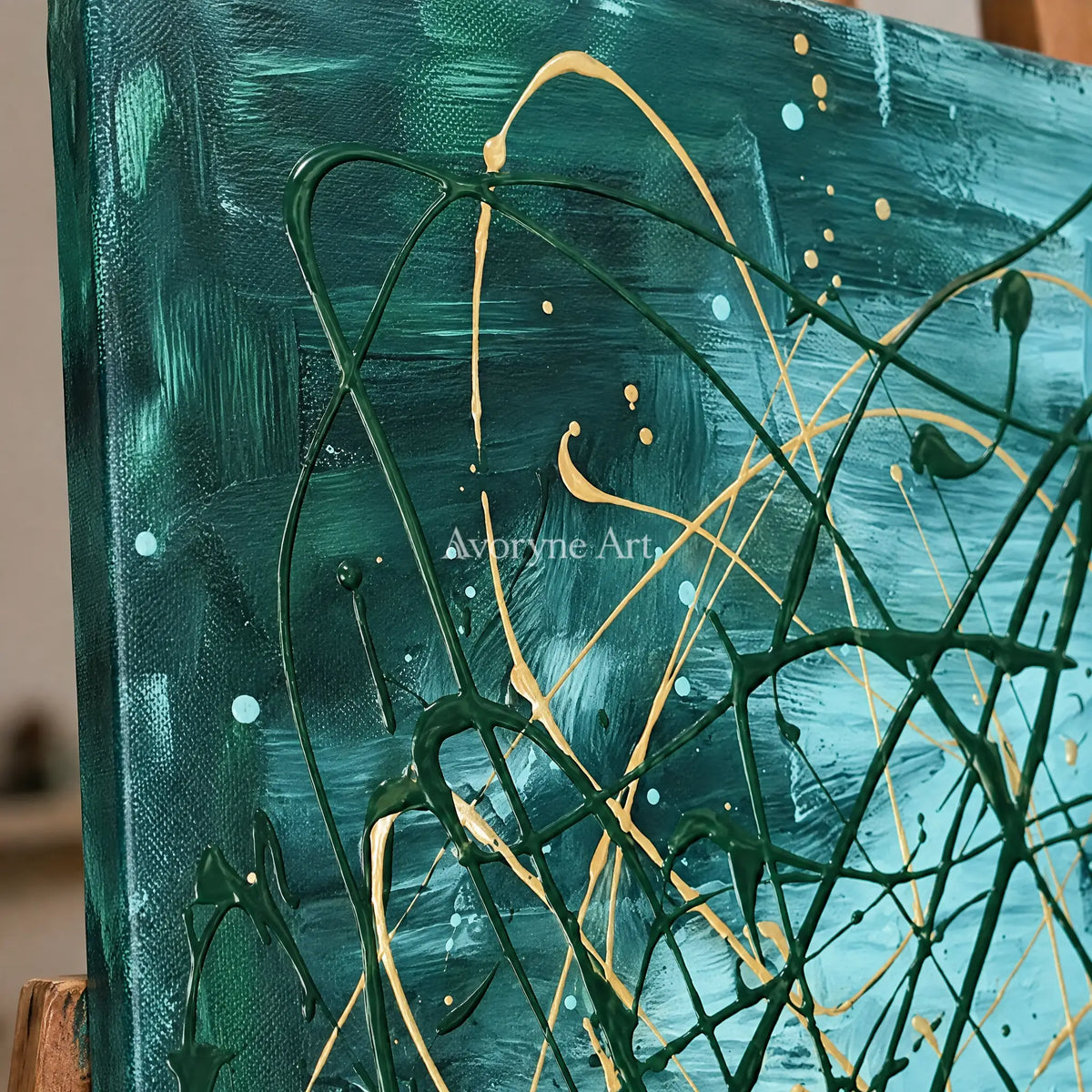 Close-up of the hand-painted texture of Golden Mosaic drip abstract wall art on an easel