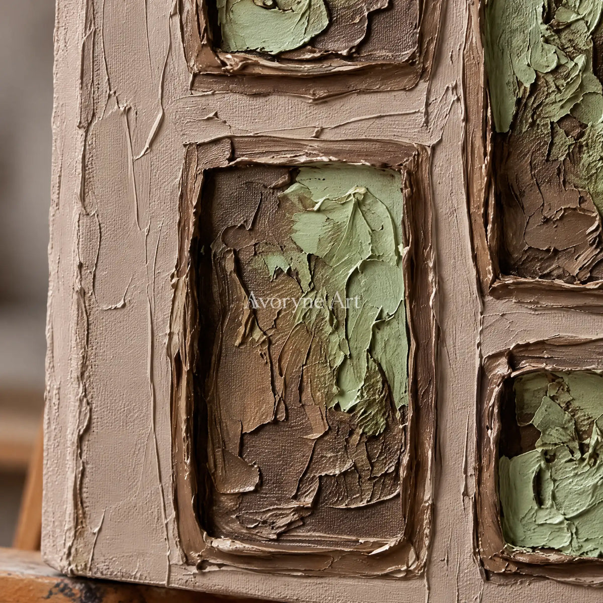 Close-up of the hand-painted texture of Misted Sonata earth grid relief wall art on an easel