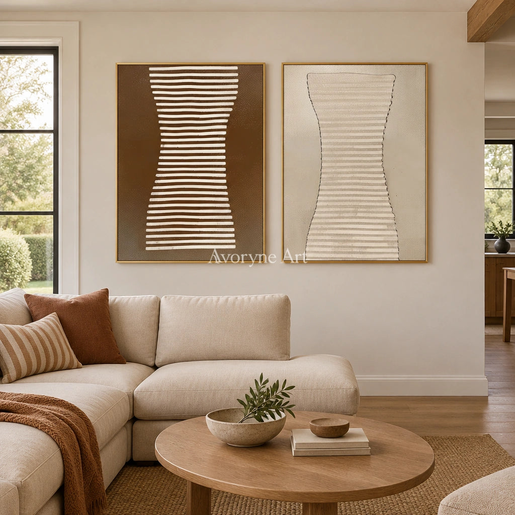 Muted Haven earth grooved curves diptych with a gold frame hanging in a living room