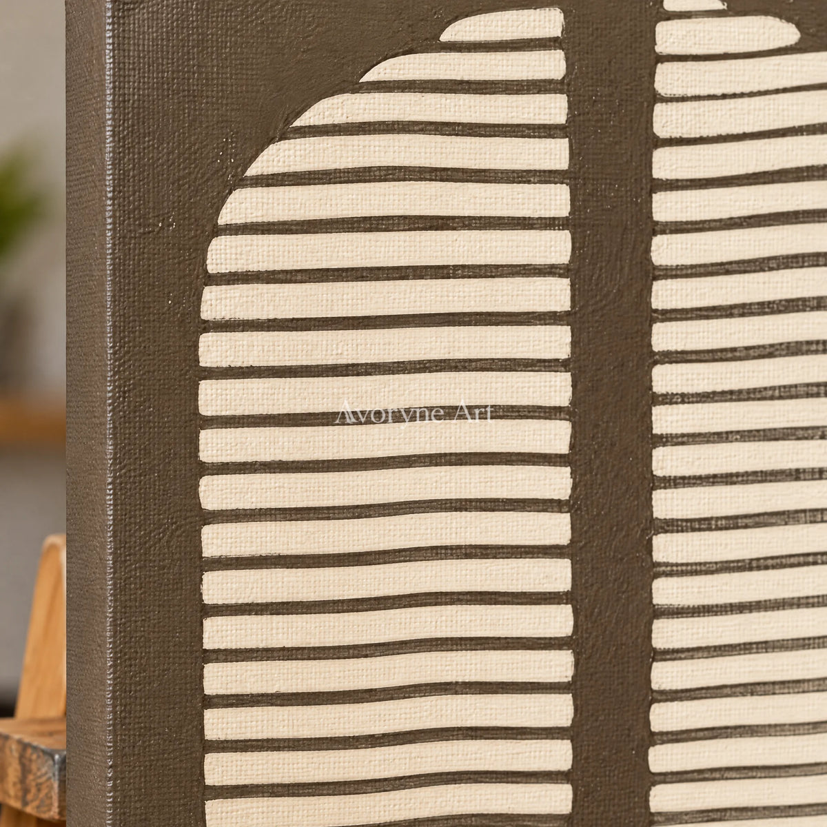 Close-up of the hand-painted texture of Muted Measure earth grooved curves diptych on an easel