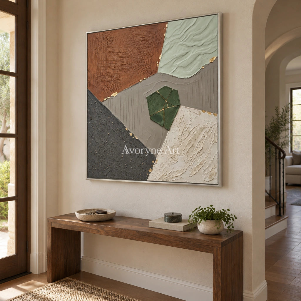 Still Measure earth patch texture wall art with a silver frame in an entryway