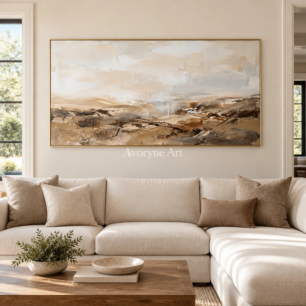 Bright Story earth tone landscape wall art with a gold frame hanging in a living room