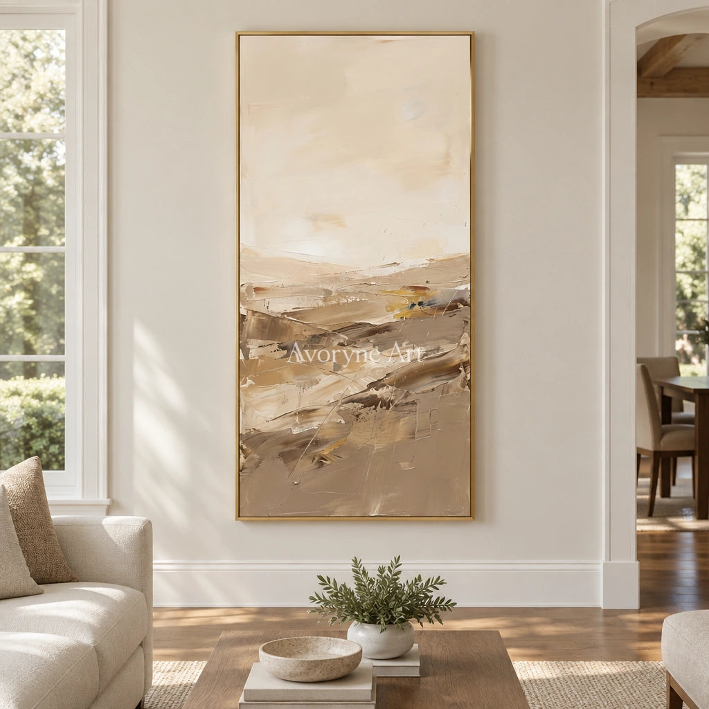 Bright Vista earth tone landscape wall art with a gold frame hanging in a living room