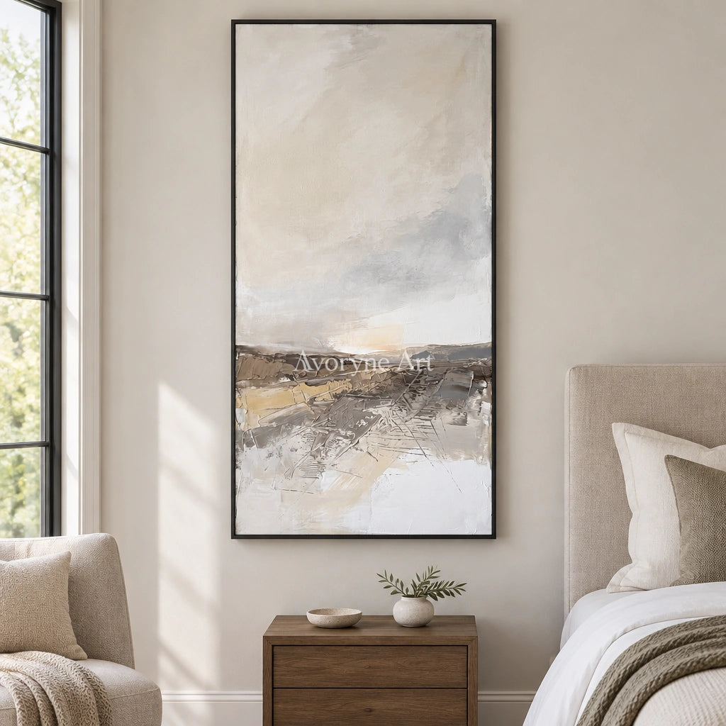 Bright Reverberation earth tone landscape wall art with a black frame above a bed in a bedroom