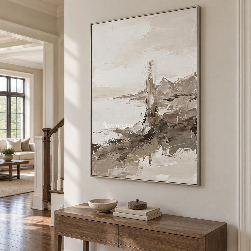 Winding Passage earth tone landscape wall art with a silver frame in an entryway