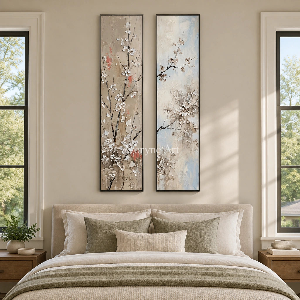 Quiet Memory floral branch diptych with a black frame above a bed in a bedroom