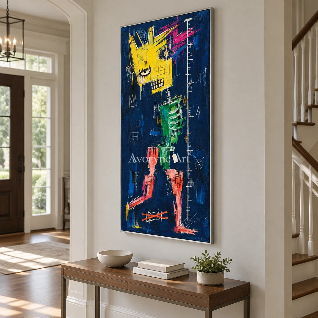 Open Gesture graffiti figure wall art with a silver frame in an entryway
