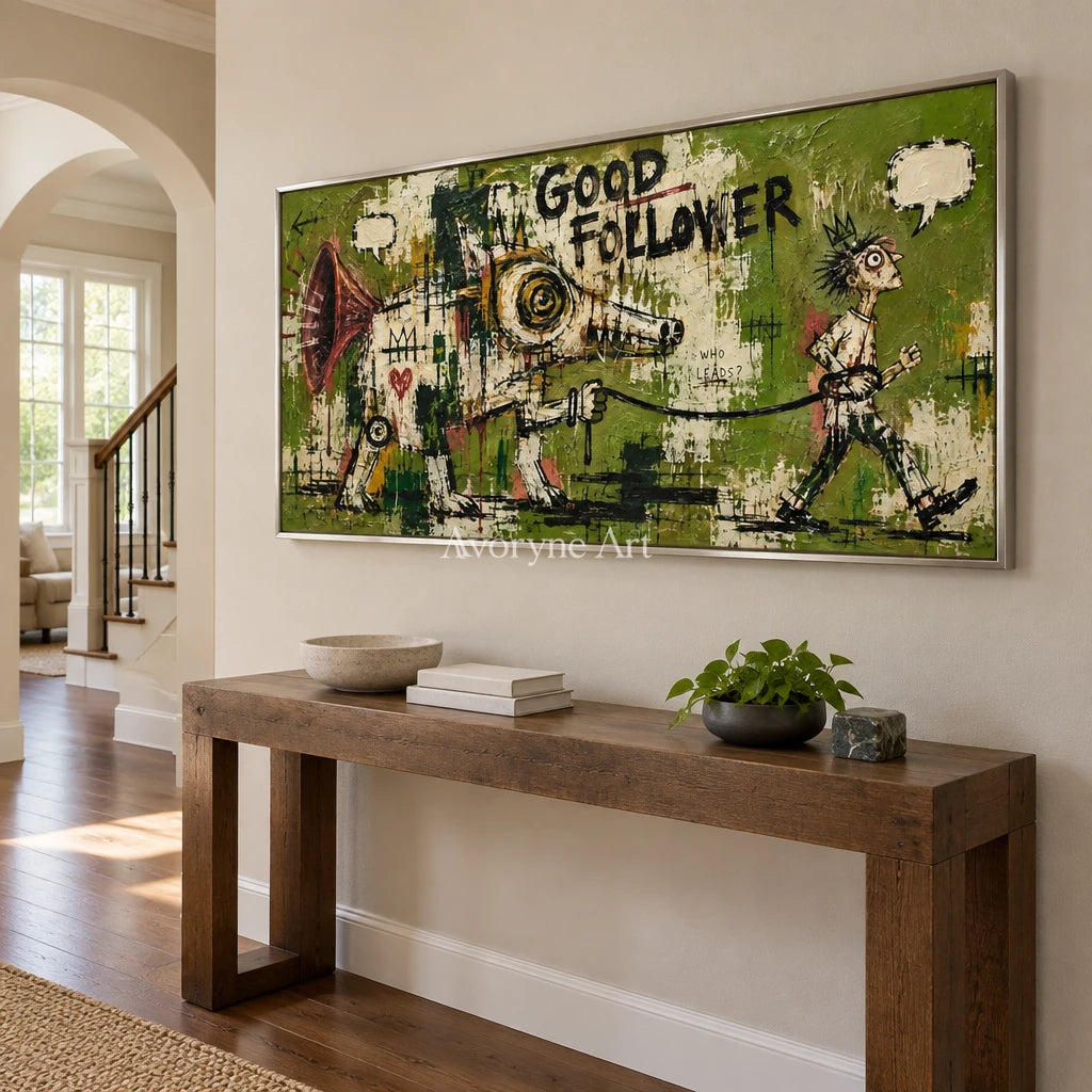 Open Memory graffiti figure wall art with a silver frame in an entryway