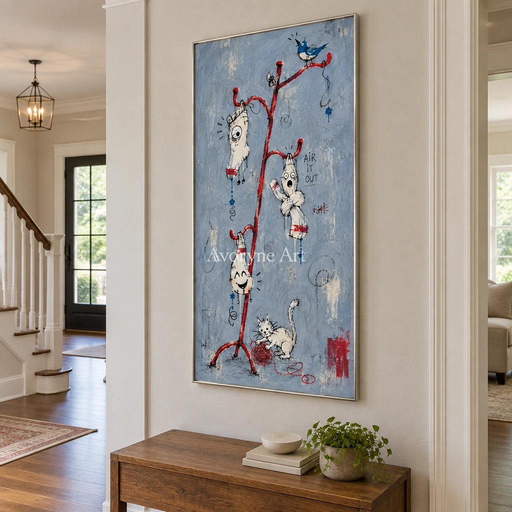 Open Current graffiti figure wall art with a silver frame in an entryway