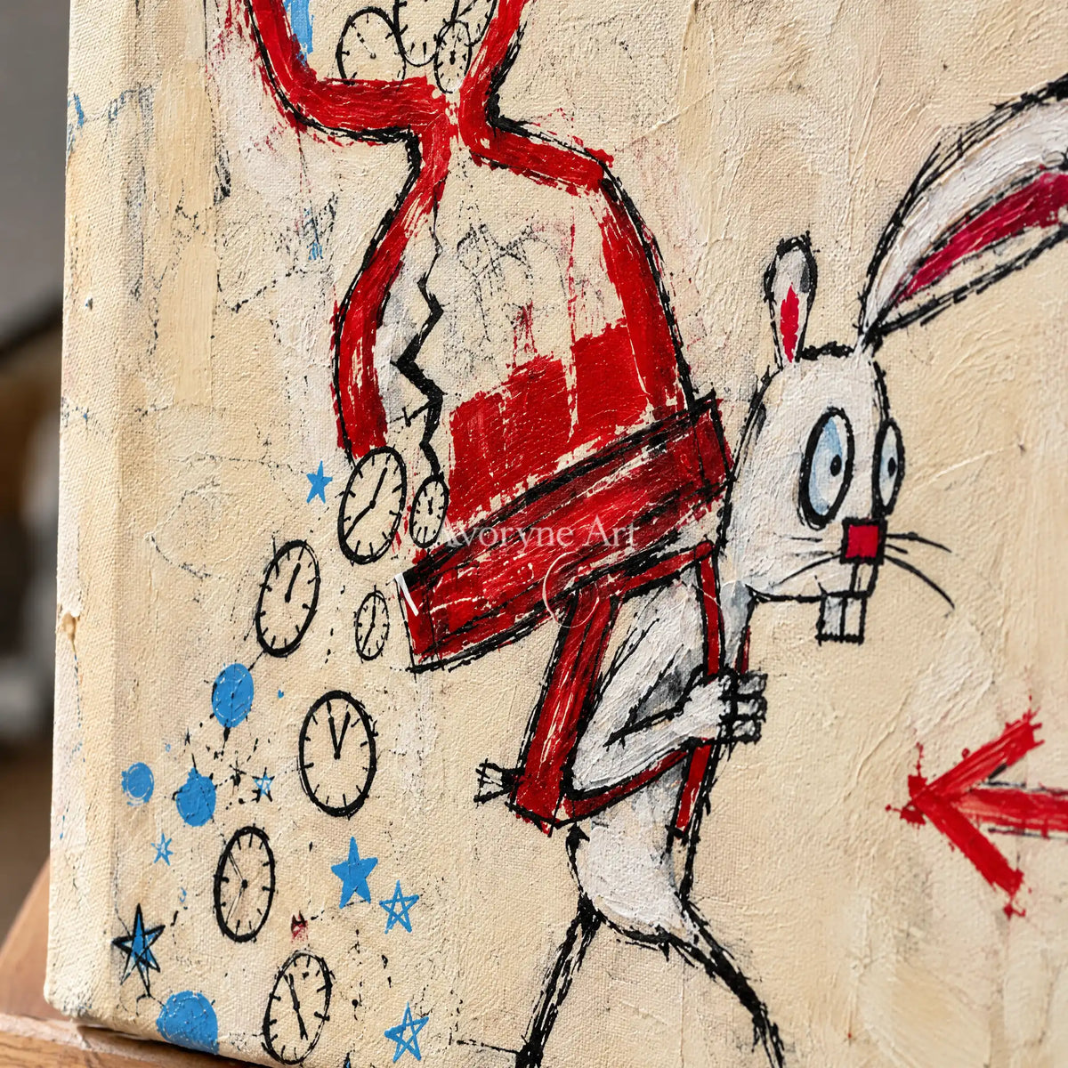 Close-up of the hand-painted texture of Open Dialogue graffiti figure wall art on an easel