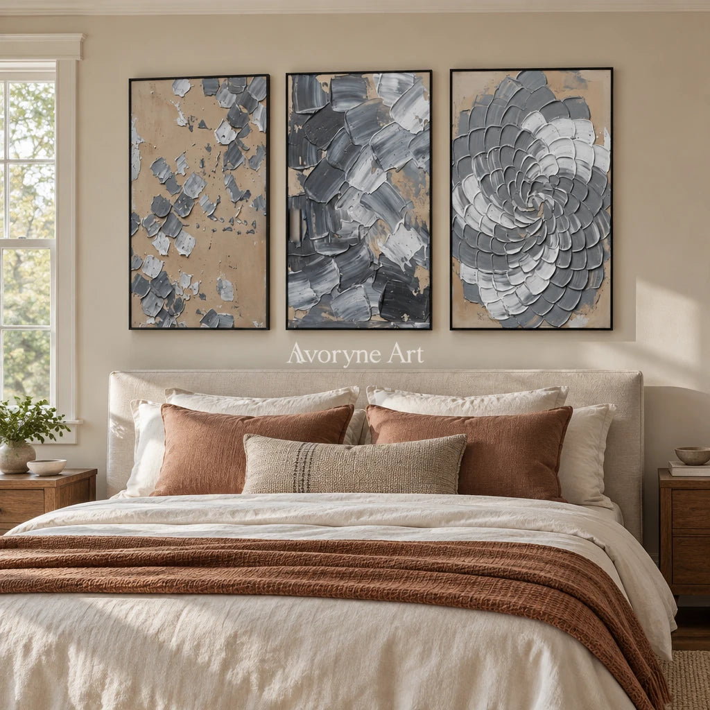 Mineral Trace gray curl relief triptych with a black frame above a bed in a bedroom