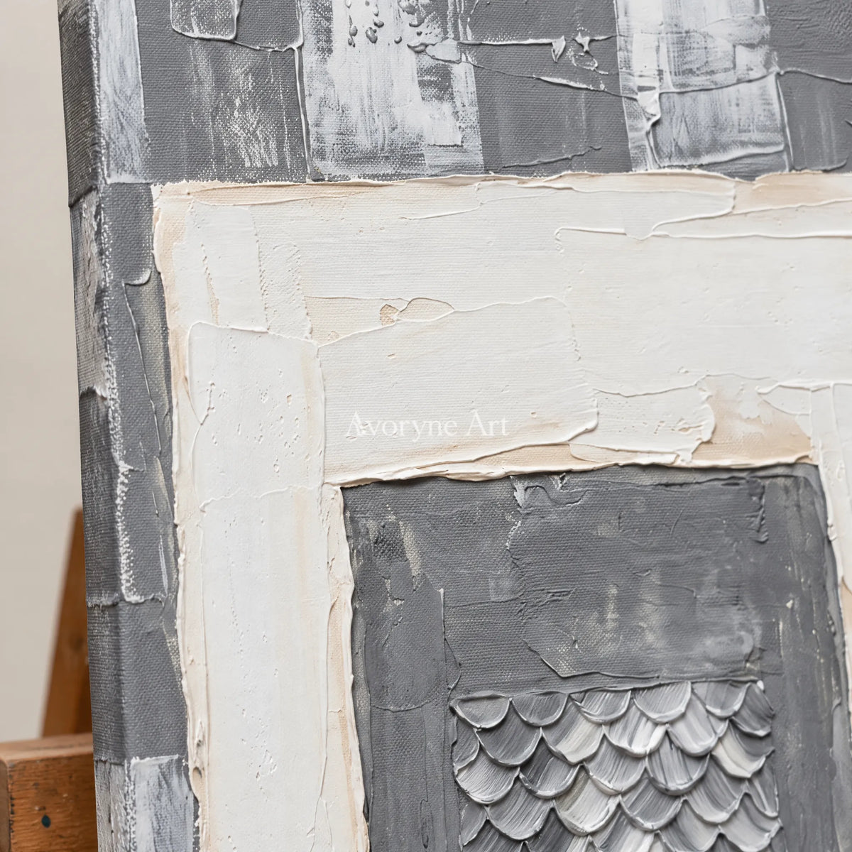 Close-up of the hand-painted texture of Hushed Memory gray scale relief wall art on an easel