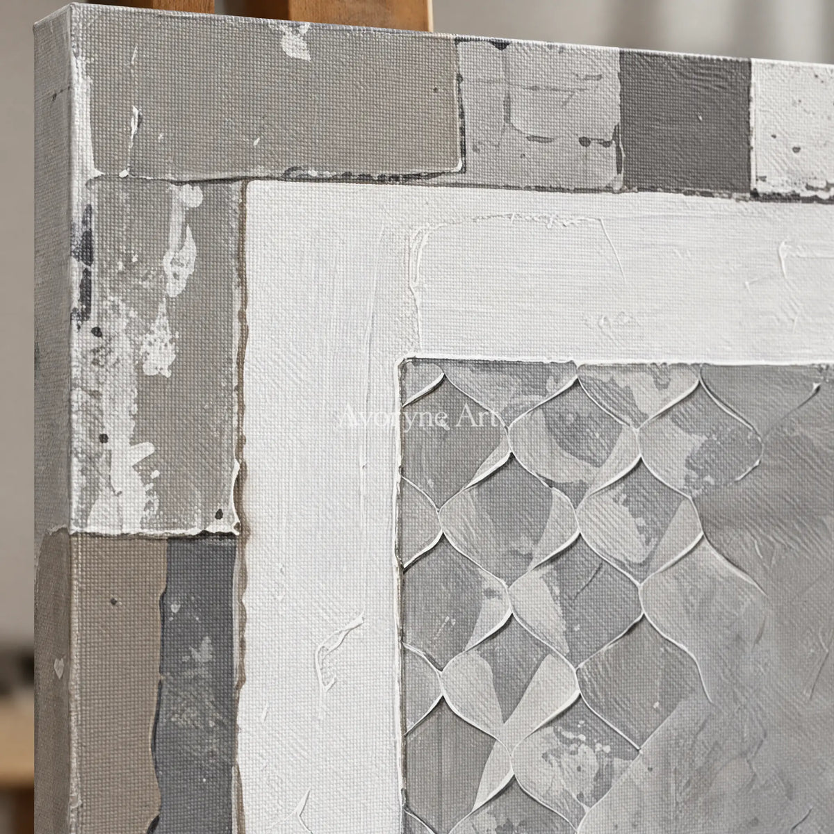 Close-up of the hand-painted texture of Soft Haven gray scale relief diptych on an easel