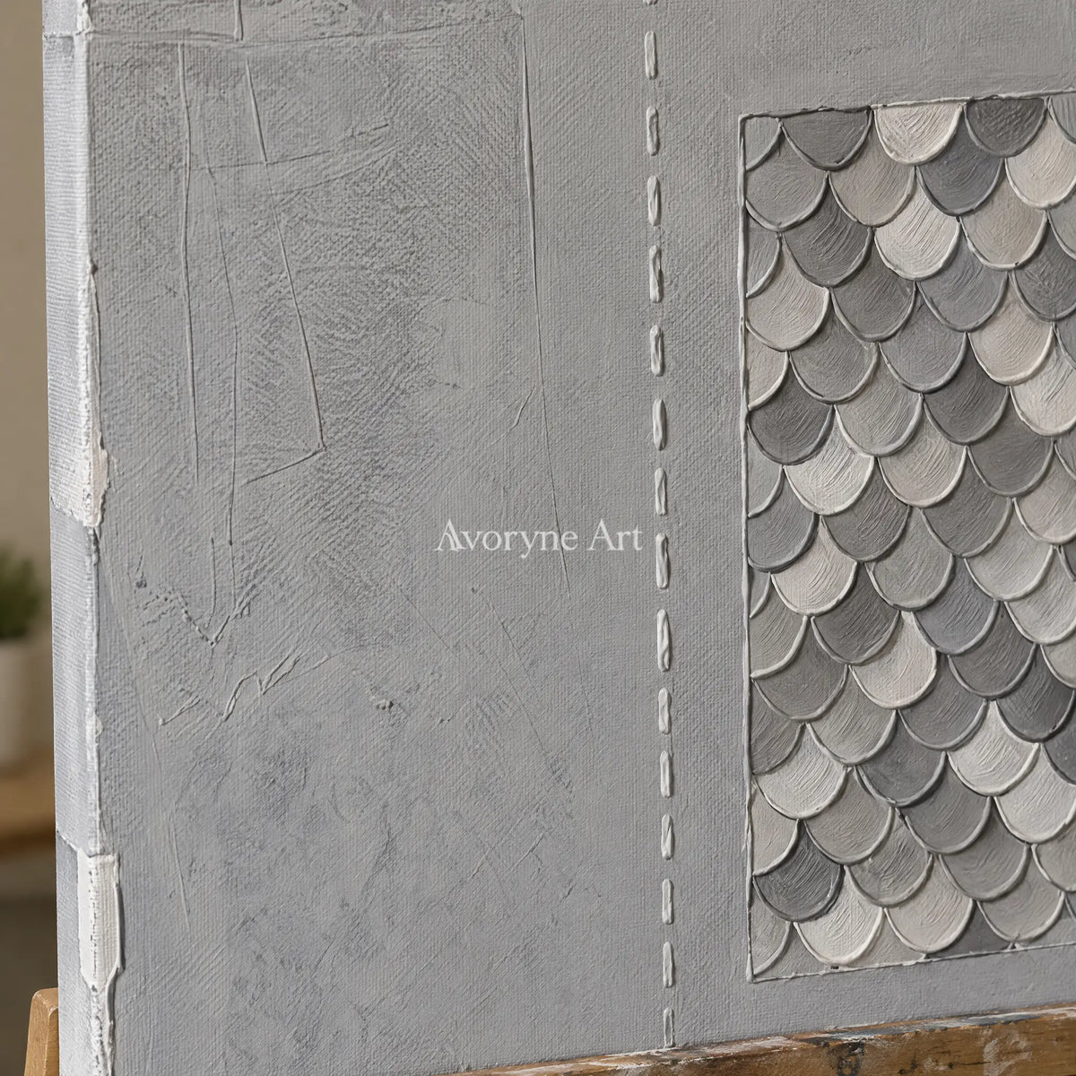 Close-up of the hand-painted texture of Hushed Reverie gray scale relief diptych on an easel