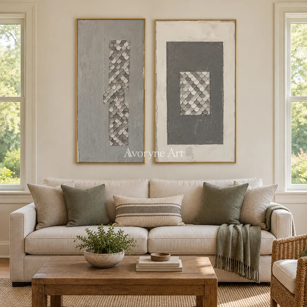 Hushed Reverie gray scale relief diptych with a gold frame hanging in a living room
