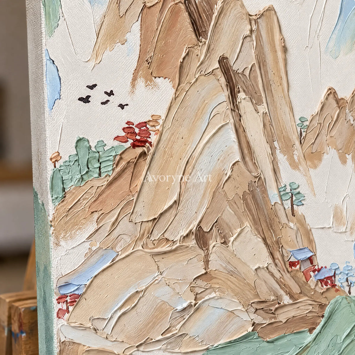Close-up of the hand-painted texture of Restful Prelude green mountain wall art on an easel