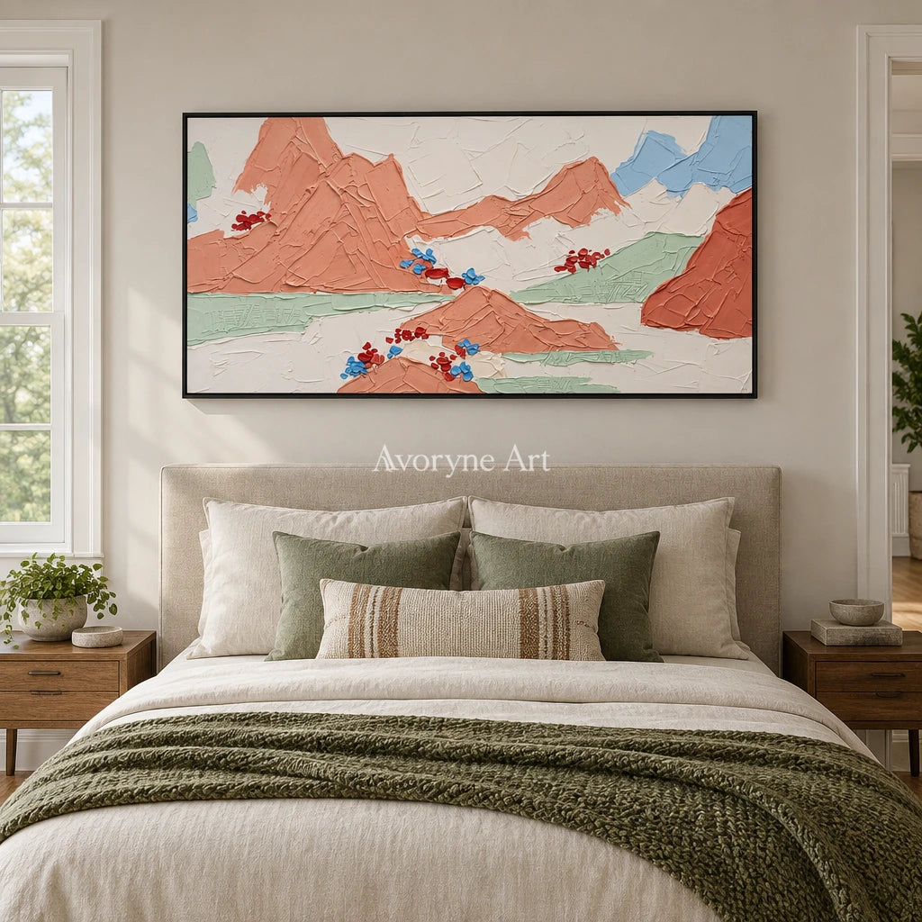 Restful Trace green mountain wall art with a black frame above a bed in a bedroom