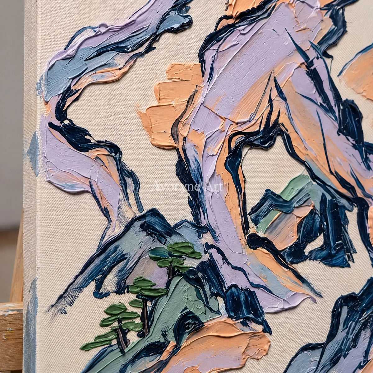 Close-up of the hand-painted texture of Restful Solace green mountain wall art on an easel