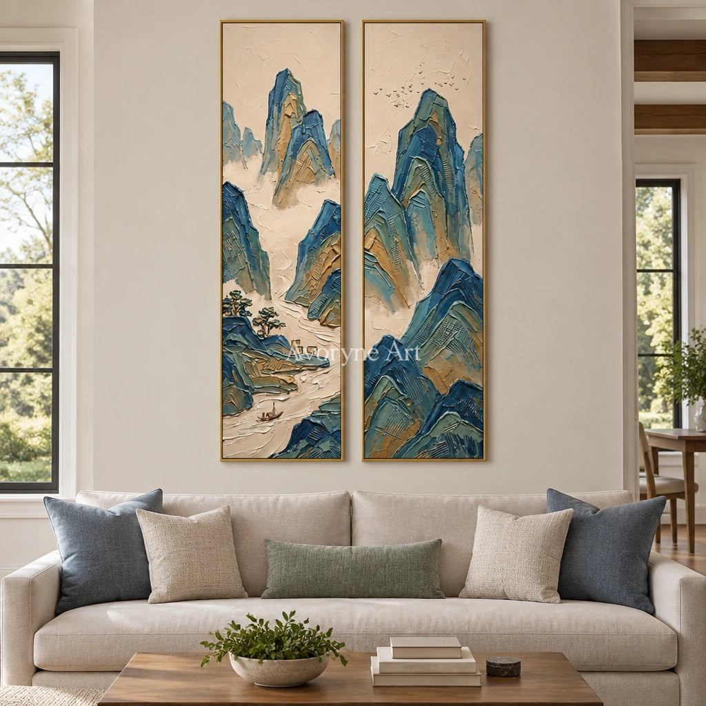 Faint Interval green mountain diptych with a gold frame hanging in a living room