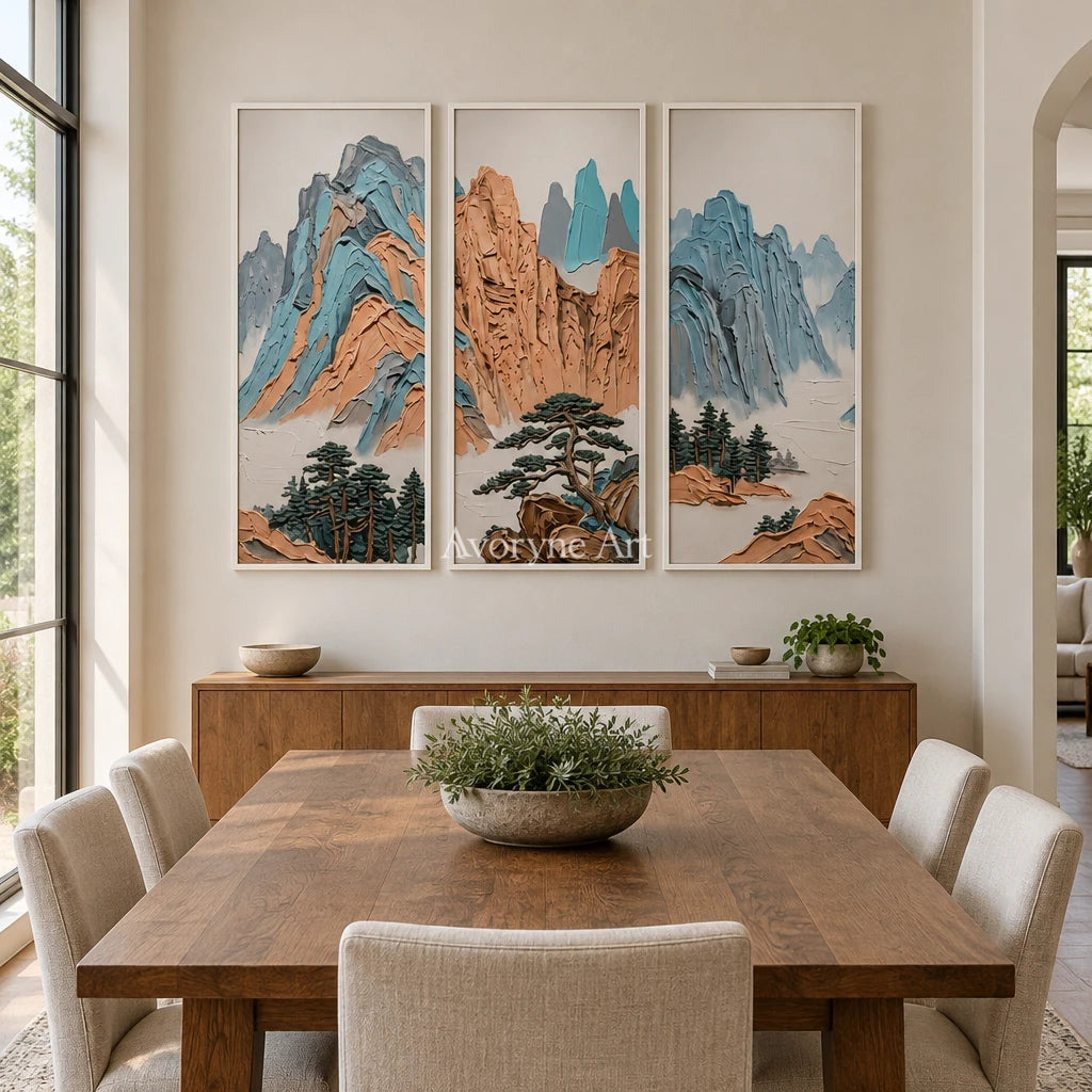 Faint Echo green mountain triptych with a white frame in a dining room