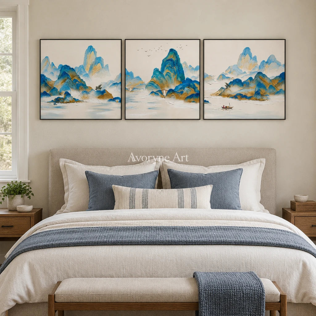 Faint Gesture green mountain triptych with a black frame above a bed in a bedroom