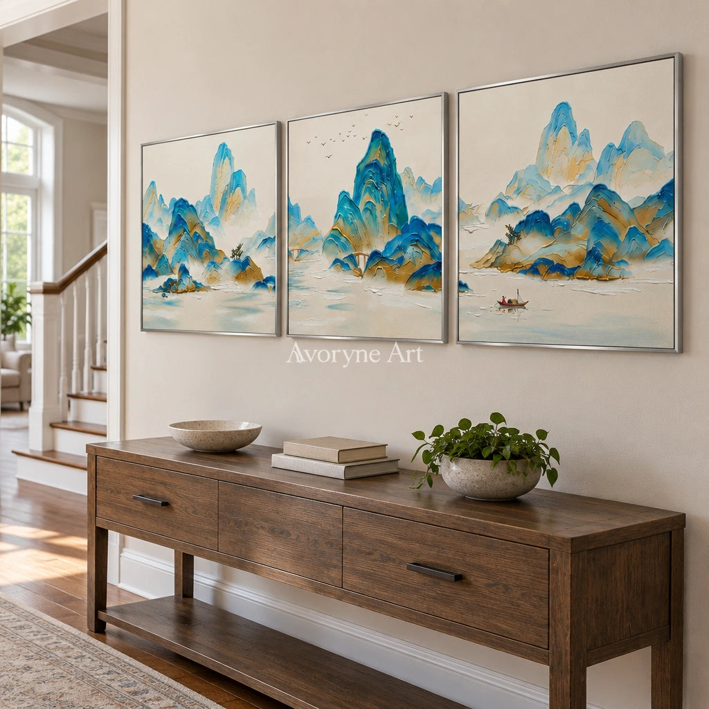 Faint Gesture green mountain triptych with a silver frame in an entryway
