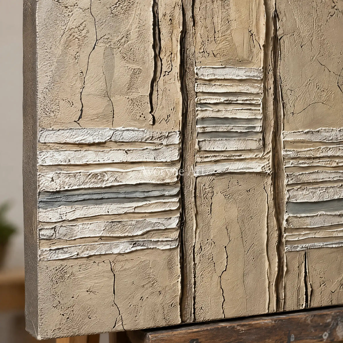 Close-up of the hand-painted texture of Amber Mosaic grooved texture wall art on an easel