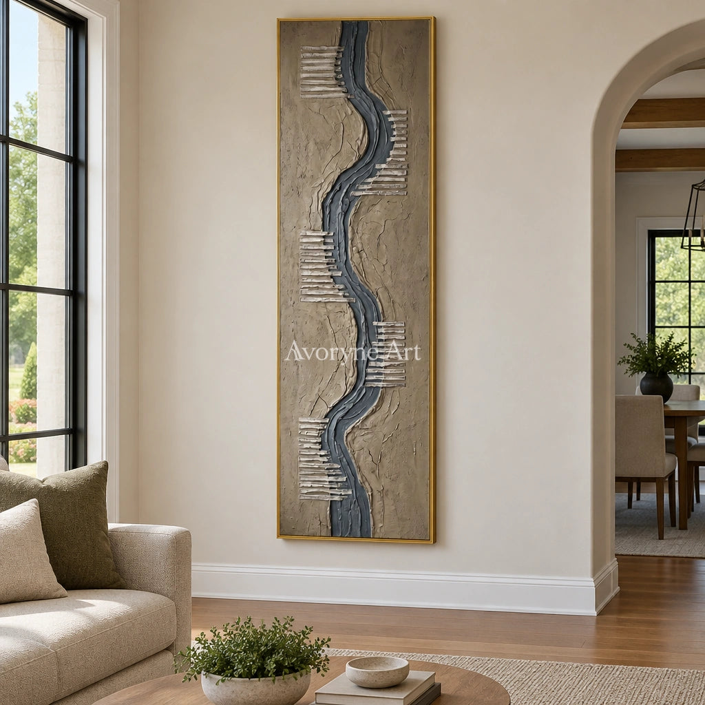 Amber Story grooved texture wall art with a gold frame hanging in a living room