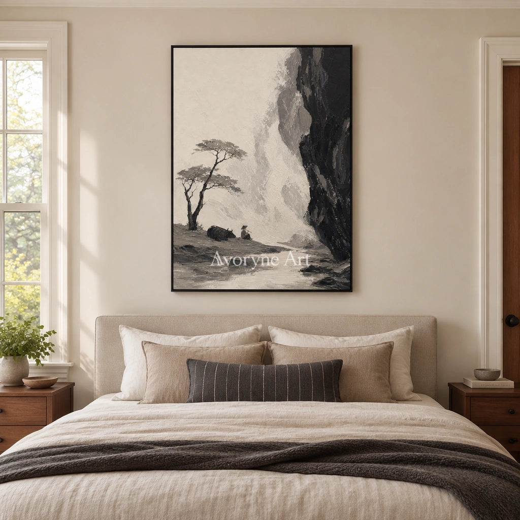 Misted Trace ink mountain pine wall art with a black frame above a bed in a bedroom