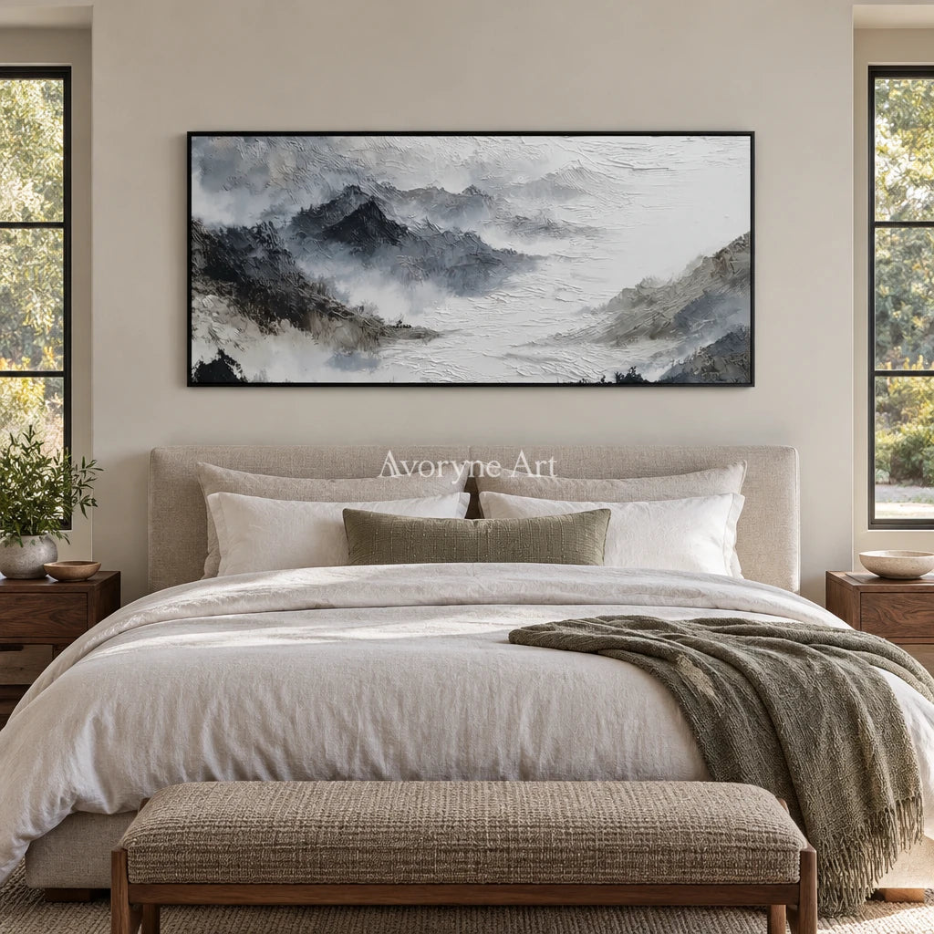 Pale Sonata ink mountain water wall art with a black frame above a bed in a bedroom