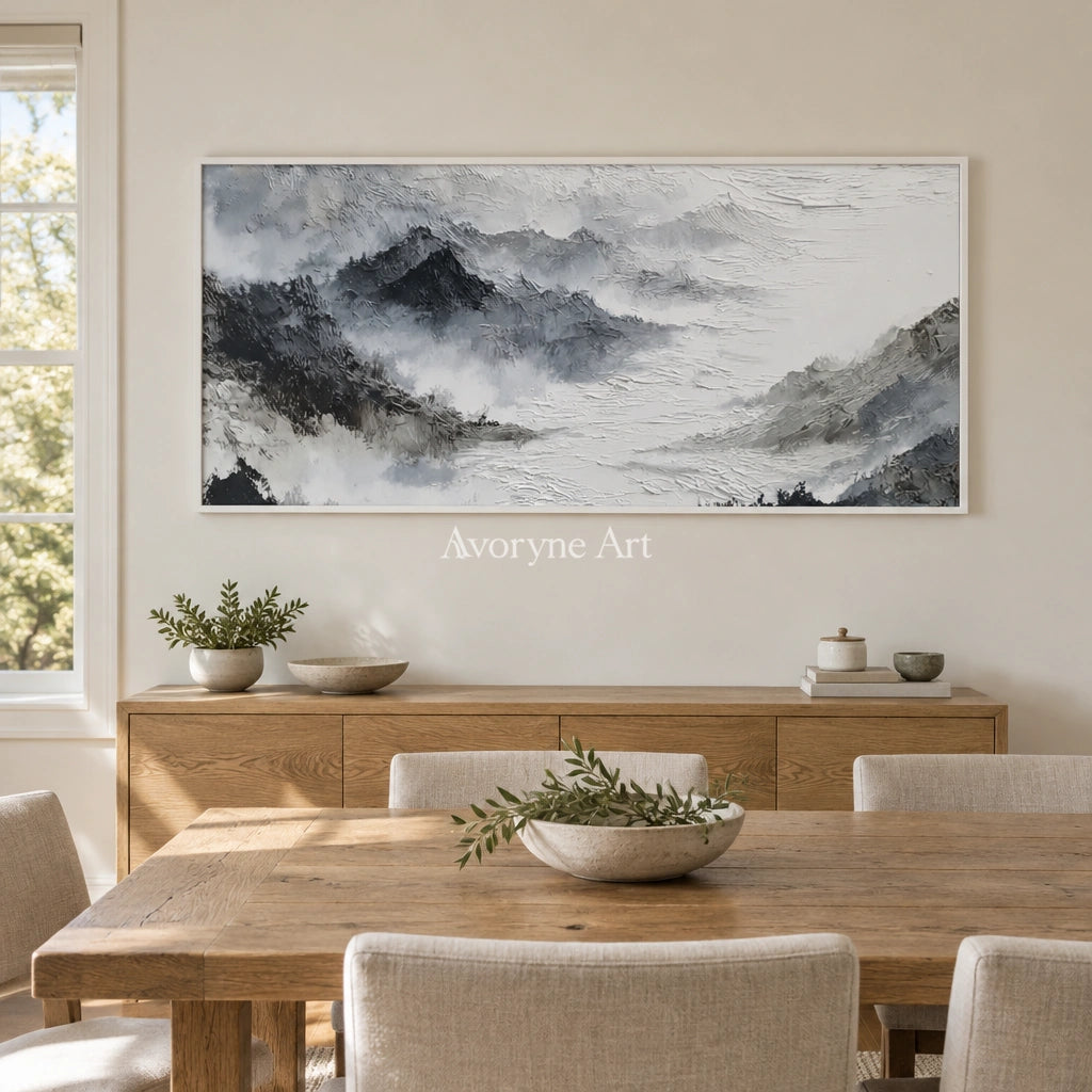 Pale Sonata ink mountain water wall art with a white frame in a dining room