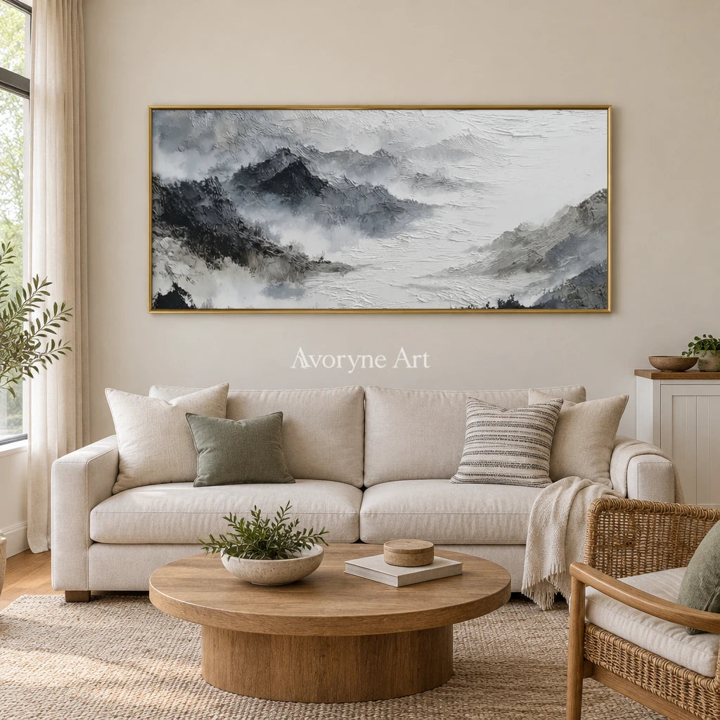 Pale Sonata ink mountain water wall art with a gold frame hanging in a living room